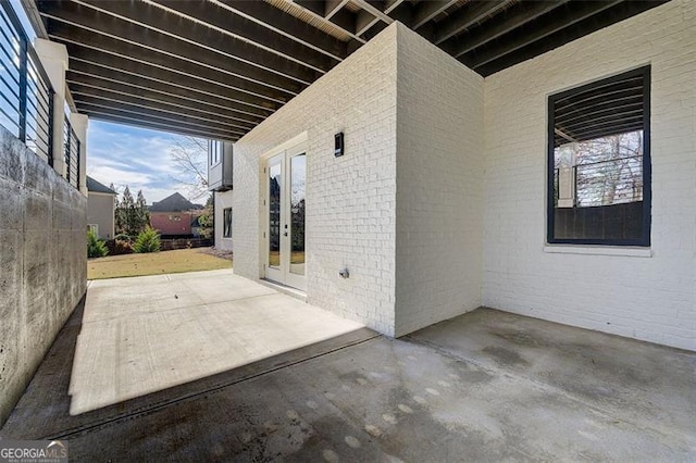 view of patio featuring french doors