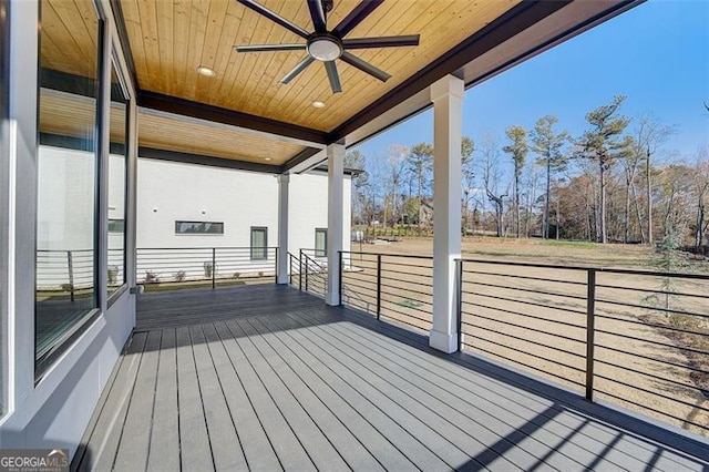 wooden deck with ceiling fan