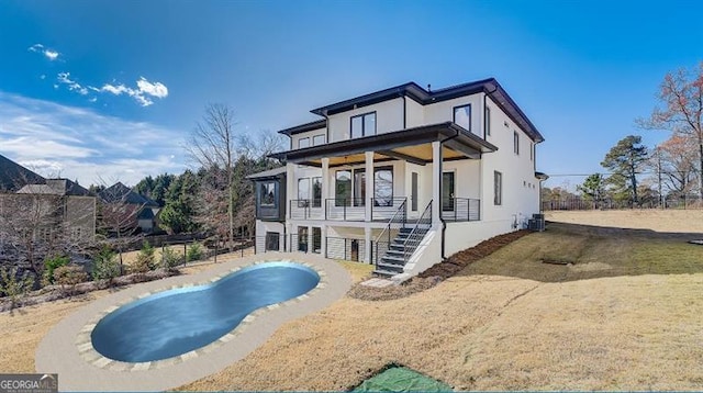 rear view of house featuring stairway, fence, central AC, and stucco siding