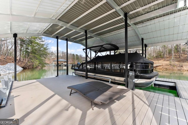 dock area featuring a water view and boat lift