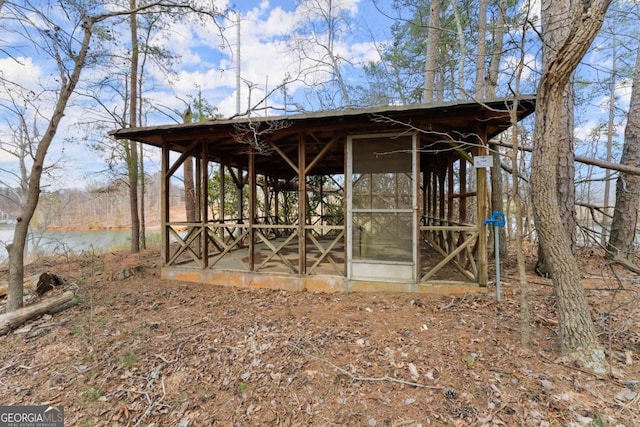 view of outdoor structure with a water view