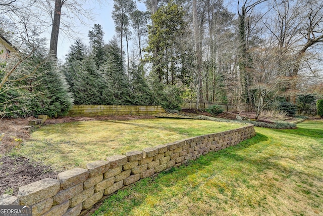 view of yard featuring fence