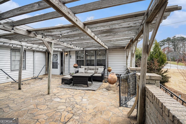 view of patio / terrace with outdoor lounge area and a pergola