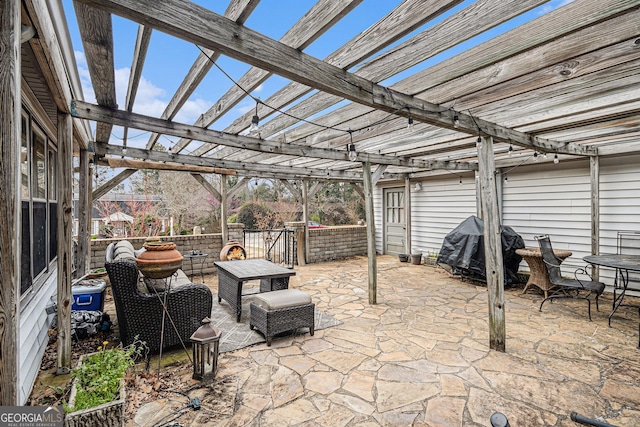 view of patio / terrace featuring a pergola