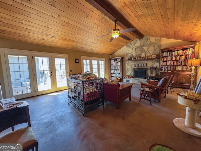 living area with wooden ceiling, french doors, and lofted ceiling with beams