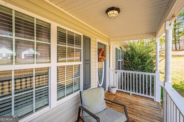 wooden terrace with covered porch