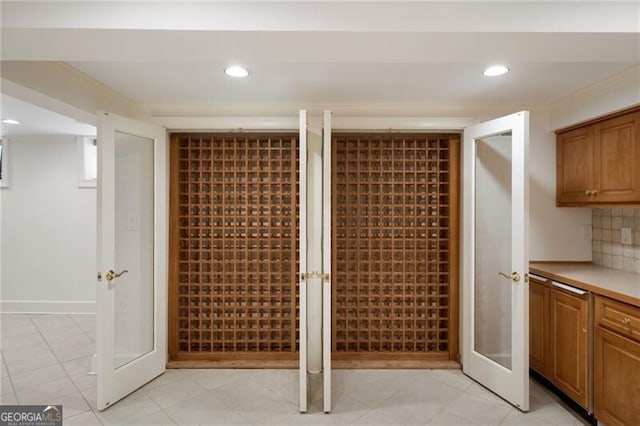 wine area featuring recessed lighting