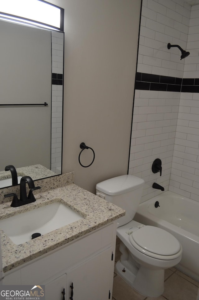 full bathroom with vanity, toilet, bathing tub / shower combination, and tile patterned flooring