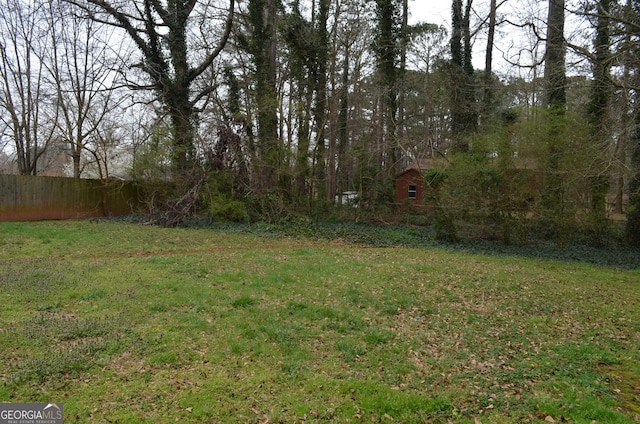 view of yard with fence