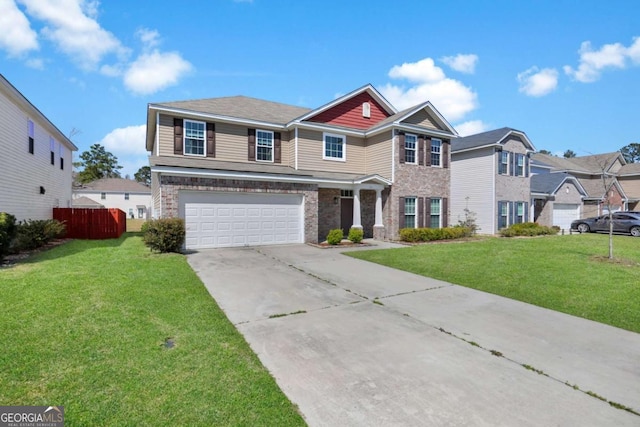 view of front facade featuring concrete driveway, fence, a garage, and a front yard