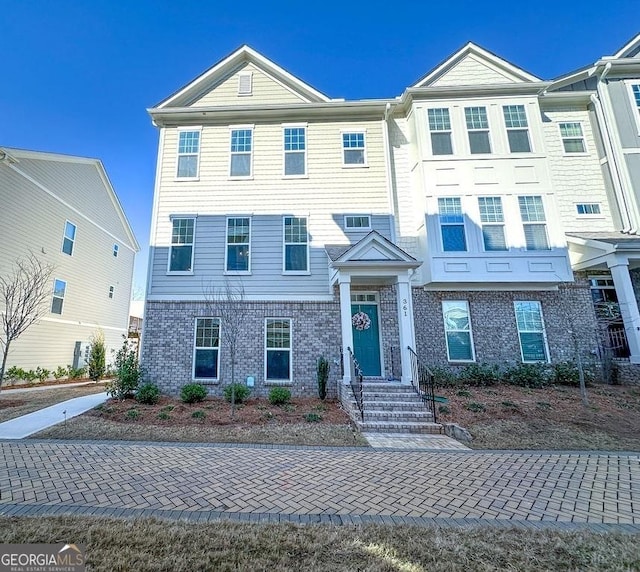 multi unit property with brick siding