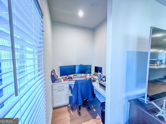 office space featuring light wood finished floors