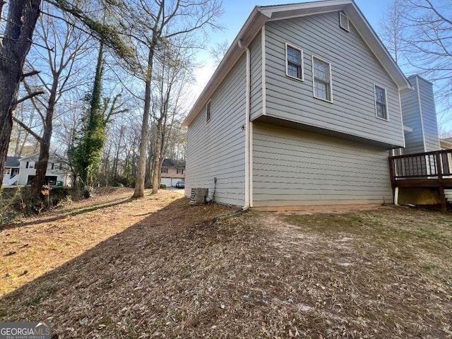 view of side of property featuring cooling unit