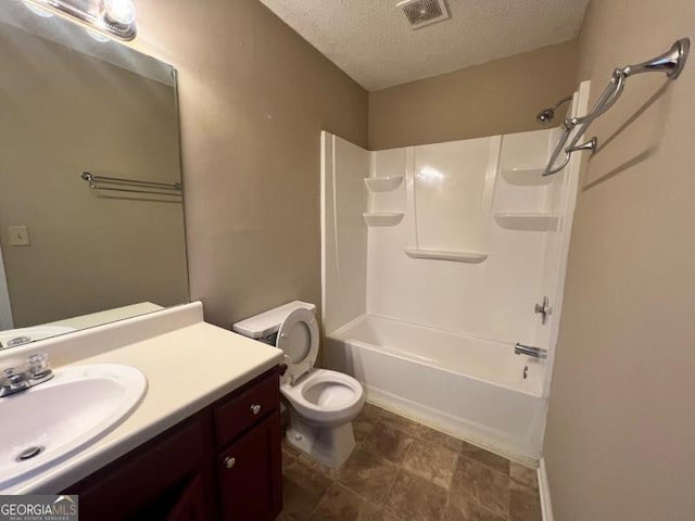 bathroom with vanity, visible vents, tub / shower combination, a textured ceiling, and toilet