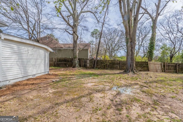 view of yard featuring fence