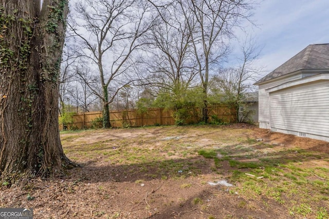 view of yard featuring fence