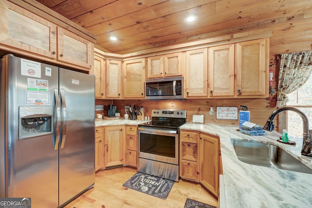 kitchen with light brown cabinetry, appliances with stainless steel finishes, wooden ceiling, and a sink