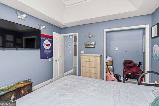 bedroom featuring baseboards