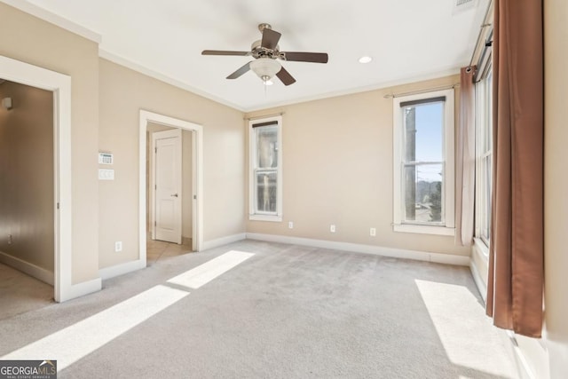 1199 Huff Rd Unit 121, Atlanta, GA 30318 - unfurnished bedroom featuring light colored carpet, ceiling fan, and ornamental molding