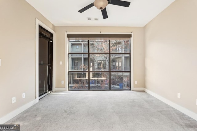 1199 Huff Rd Unit 121, Atlanta, GA 30318 - unfurnished room featuring a ceiling fan and carpet