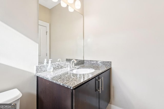 1199 Huff Rd Unit 121, Atlanta, GA 30318 - bathroom featuring vanity and toilet