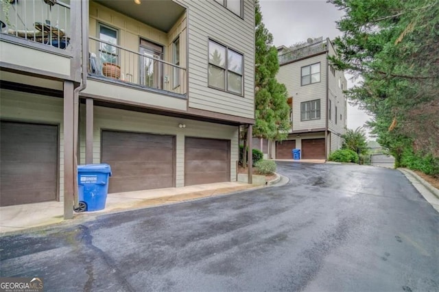 1199 Huff Rd Unit 121, Atlanta, GA 30318 - view of front of house with an attached garage