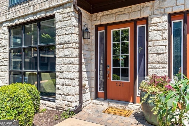1199 Huff Rd Unit 121, Atlanta, GA 30318 - property entrance featuring stone siding