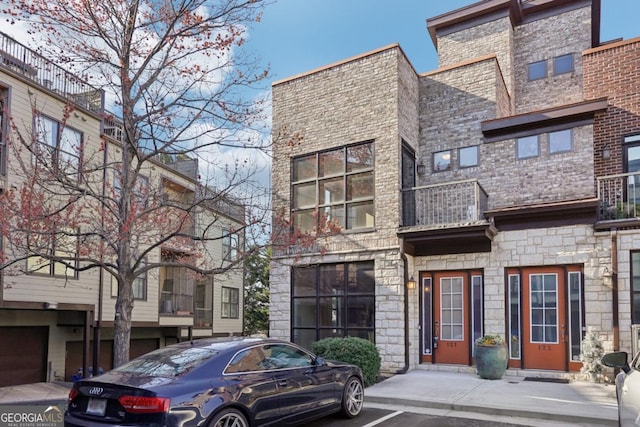 1199 Huff Rd Unit 121, Atlanta, GA 30318 - view of front of home with stone siding