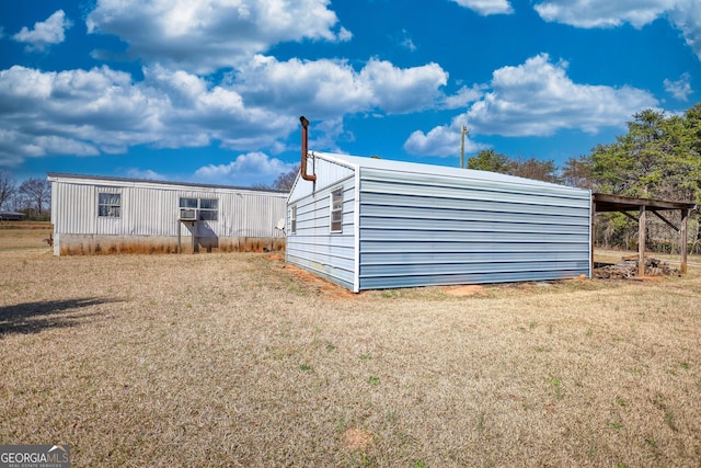 view of outbuilding with an outdoor structure