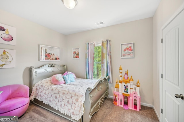 bedroom featuring baseboards, visible vents, and carpet floors