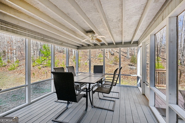 sunroom / solarium with ceiling fan