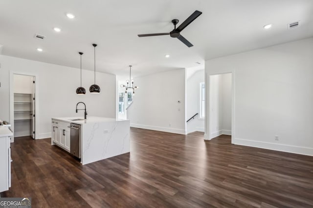 kitchen with visible vents, ceiling fan with notable chandelier, stainless steel dishwasher, and a sink