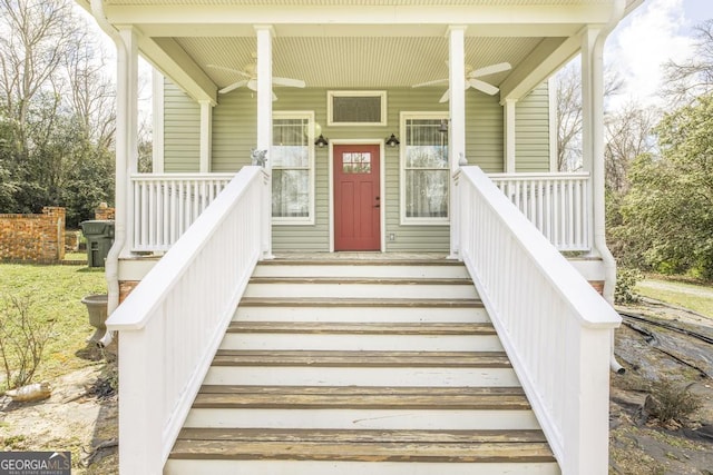 view of exterior entry with a porch