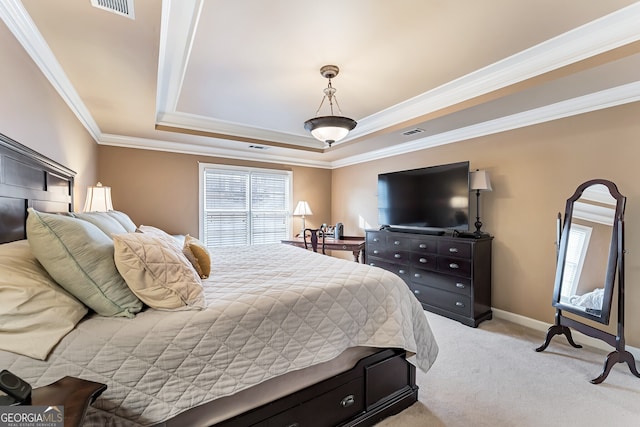 2205 Parliament Dr, Lawrenceville, GA 30043 - bedroom with a raised ceiling, light carpet, crown molding, and baseboards