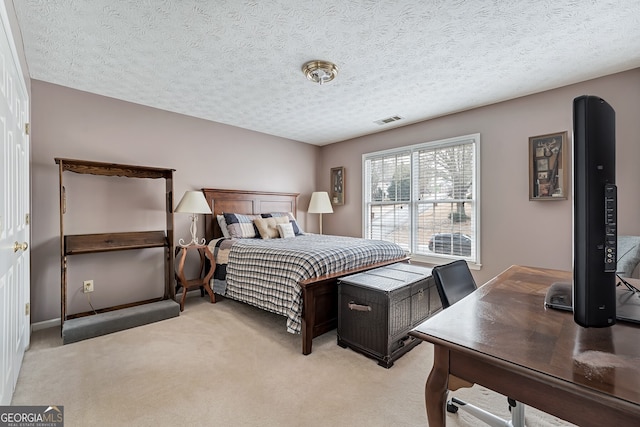2205 Parliament Dr, Lawrenceville, GA 30043 - bedroom featuring light carpet, an office area, and a textured ceiling
