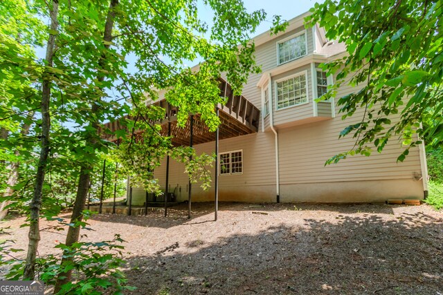 2205 Parliament Dr, Lawrenceville, GA 30043 - back of property with a deck