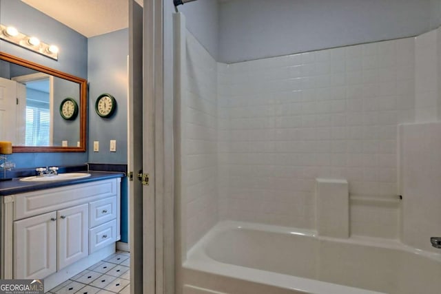 bathroom with vanity and bathing tub / shower combination