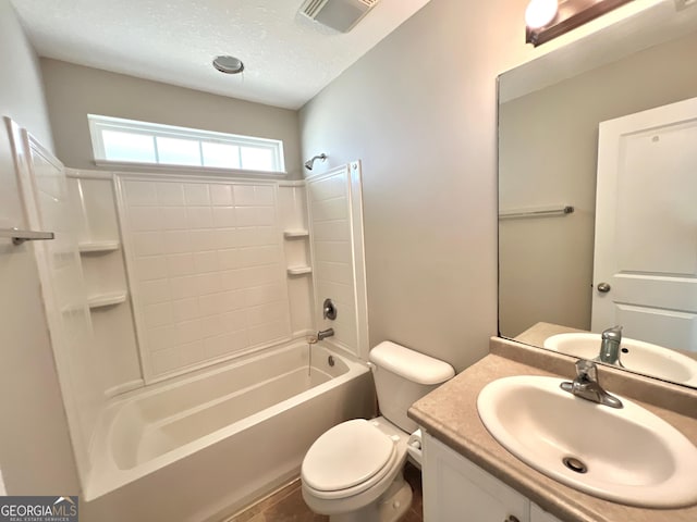 bathroom with visible vents, toilet, a textured ceiling, shower / bathing tub combination, and vanity