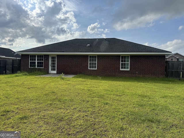 213 Augusta Way, Hinesville, GA 31313 - back of property with a patio area and brick siding