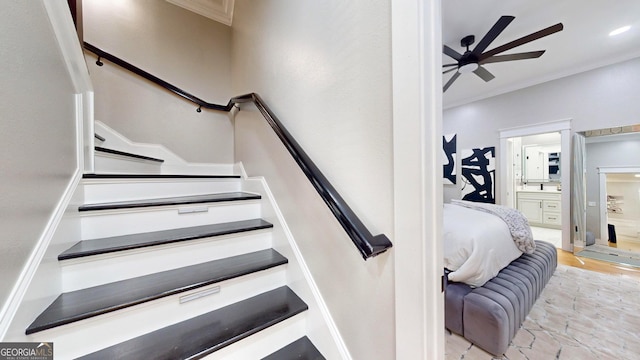 stairs featuring recessed lighting, ceiling fan, and ornamental molding