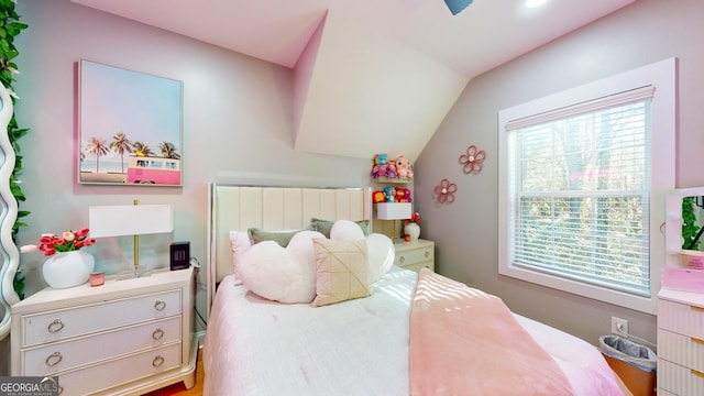 bedroom featuring vaulted ceiling