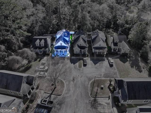 birds eye view of property with a residential view