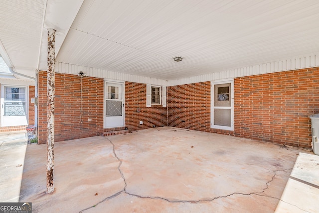 view of patio / terrace featuring an attached carport