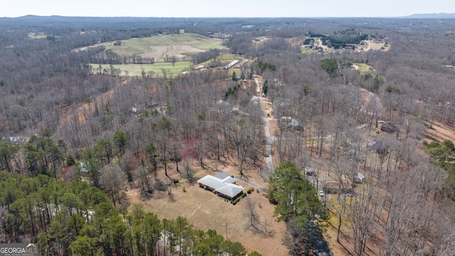 drone / aerial view with a forest view