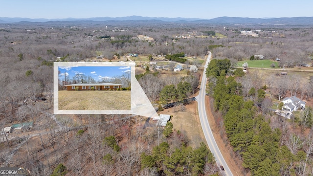 aerial view featuring a mountain view