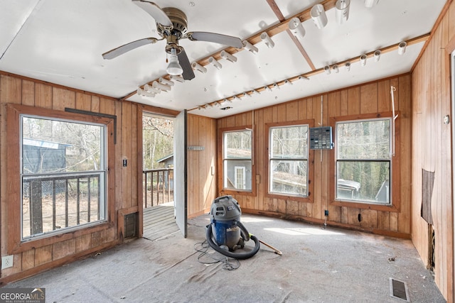 unfurnished sunroom with track lighting, visible vents, and ceiling fan