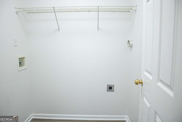 washroom with electric dryer hookup, baseboards, and washer hookup