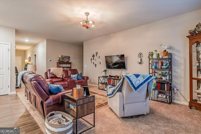 living room featuring baseboards