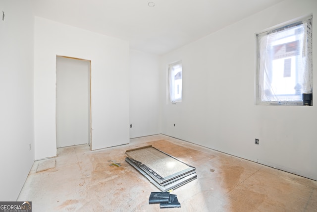 spare room featuring plenty of natural light