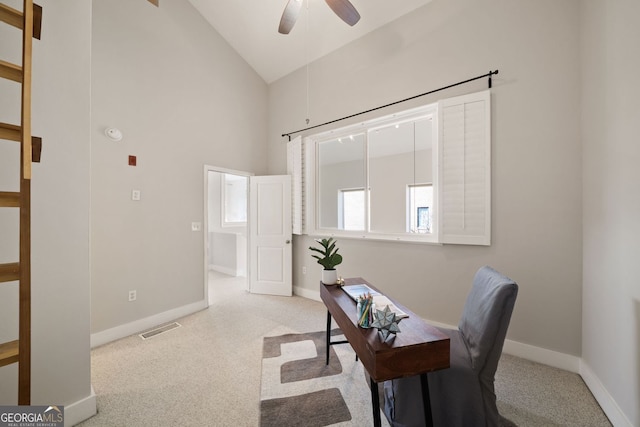 office area featuring visible vents, baseboards, carpet, and a ceiling fan